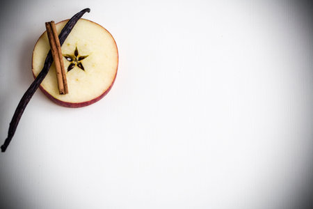 Christmas postcard with apple star, vanilla and cinamon