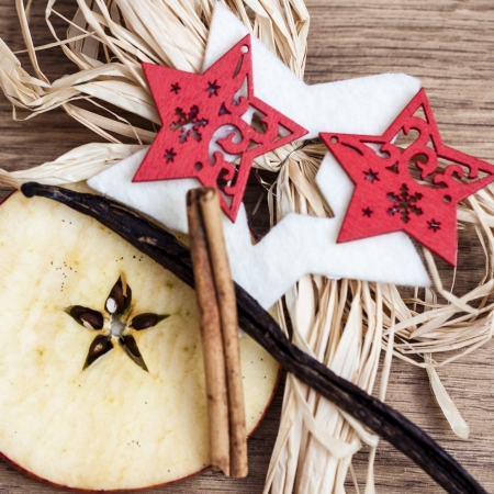 Christmas decoration with apple star, vanilla and cinamonの写真素材