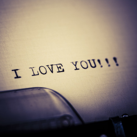 Beautiful "I love you" message typed by vintage typewriterの写真素材