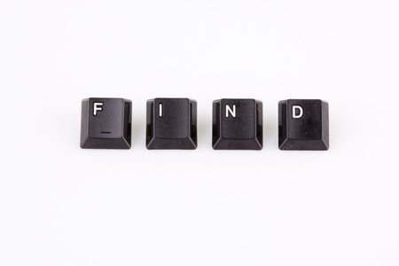 find word written with black computer buttons on white の写真素材