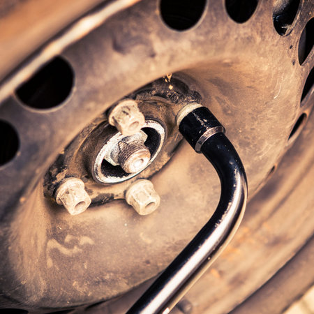 Changing tires or wheel before winter or springの写真素材