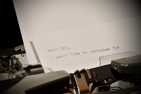 Letter with a title Dear Sir typed on old typewriter