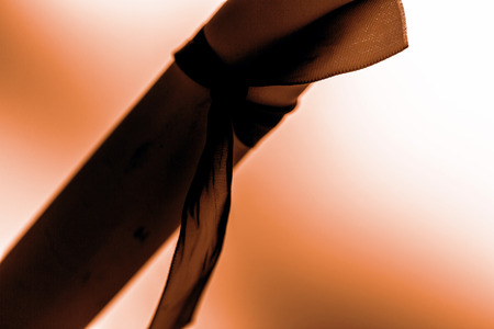 retro rolled paper on the old wooden tableの写真素材