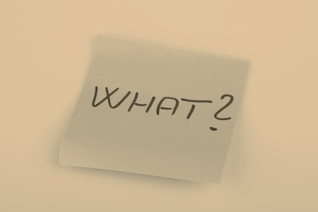 text what on short orange note paperの写真素材