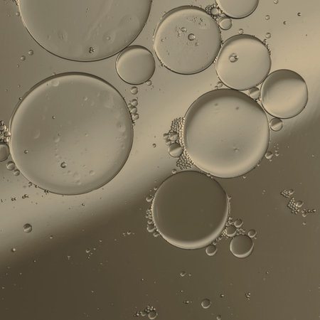 Oil drops on a water surface with color background