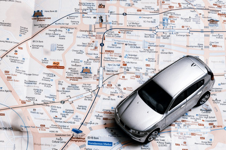 travel concept -  small silver car on Dublin city map, South Korea, Asiaのeditorial素材
