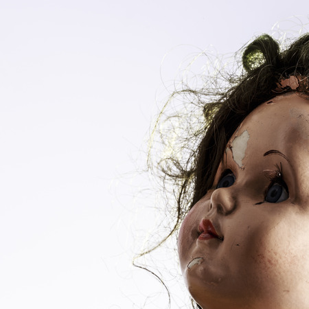 head of beatiful scary doll like from horror movie - evil face, grunge, macroの写真素材
