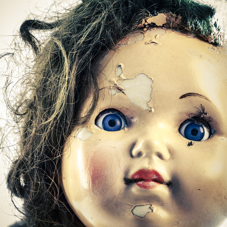 head of beatiful scary doll like from horror movie - evil face, grunge, macroの写真素材