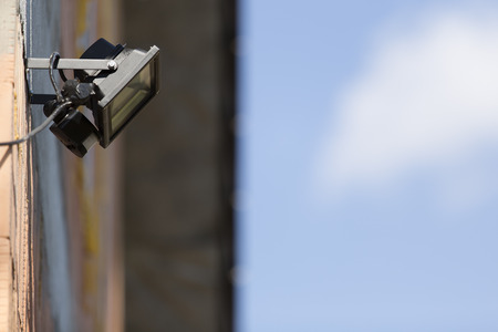 security led light with motion dectector or sensor on the wall of houseの写真素材