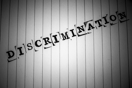 discrimination text on white paperの写真素材