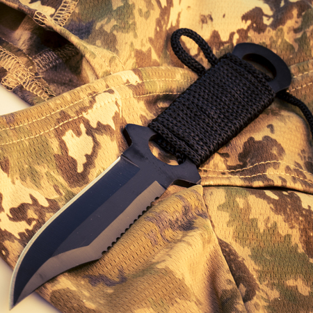 uniform camouflage helmet and army knife - fashionの写真素材