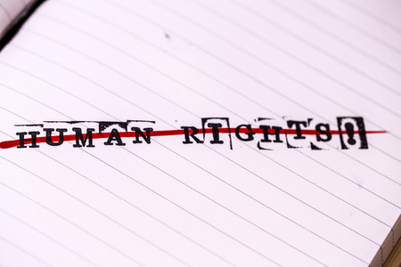 no human rights, strikethrough text on paper in retro styleの写真素材