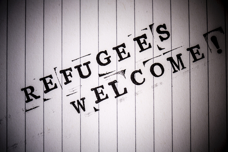 refugees welcome text on white line paperの写真素材