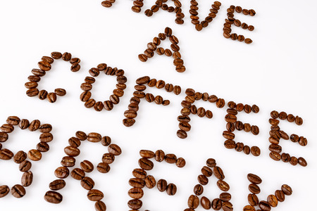 text have a coffee break from beans on whiteの写真素材