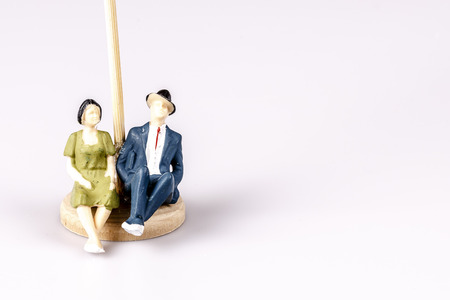 toy models of old couple on whiteの写真素材