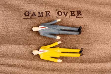 text game over with human bodies of mans and womans - death conceptの写真素材
