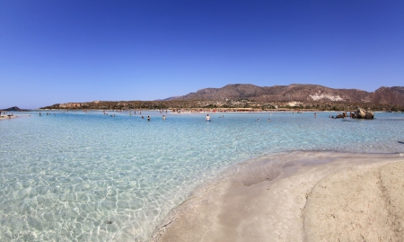 ELAFONISI, GREECE - SEPTEMBER 10: Shallow clear sea with pink sand at Elafonisi (Crete) on September 10, 2013 in Elafonisiのeditorial素材