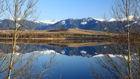 Water reflection on water basin Liptovska Mara, Slovakia の写真素材