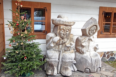 LIPTOVSKY JAN, SLOVAKIA - JANUARY 4  Wooden statues in front of restaurant on January 4, 2014 in Liptovsky Janのeditorial素材