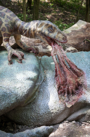 BRATISLAVA, SLOVAKIA - JUN 28: Realistic model of dinosaur Deinonychus at Dinopark on Jun 28, 2014 in Bratislavaのeditorial素材