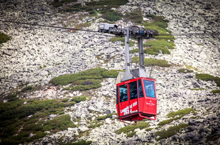 TATRANSKA LOMNICA, SLOVAKIA - JULY 26: Ropeway from Skalnate pleso to peak Lomnicky stit in Tatras mountains on July 26, 2014 in Tatranska Lomnicaのeditorial素材