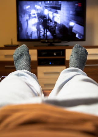 Watching televisionの写真素材