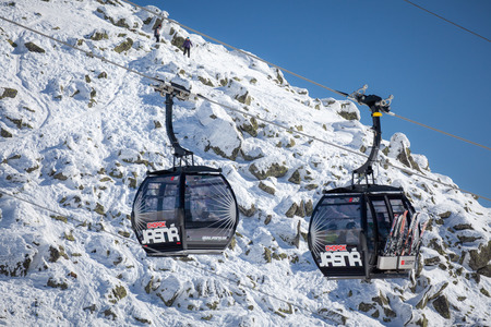 JASNA, SLOVAKIA - FEBRUARY 18: Modern cableway in ski resort Jasna - Low Tatras mountains on February 18, 2015 in Jasnaのeditorial素材