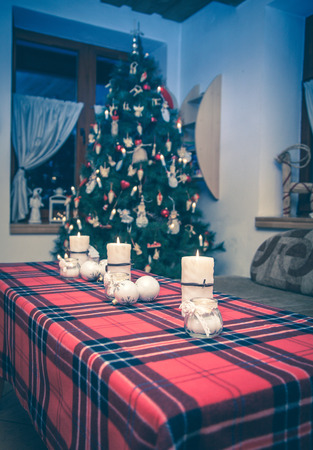 Christmas candles on the tableの写真素材
