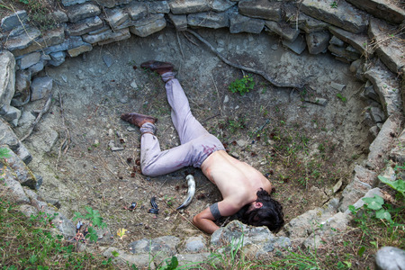 HAVRANOK, SLOVAKIA - JULY 7: Celtic ritual murder at open air museum Havranok on July 7, 2015 in Havranokのeditorial素材