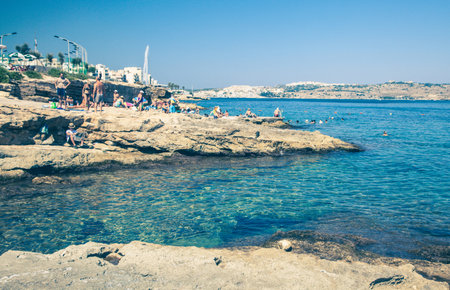 BUGGIBA, MALTA - JULY 16: Beaches at summer resort Buggiba on July 16, 2015 in Maltaのeditorial素材