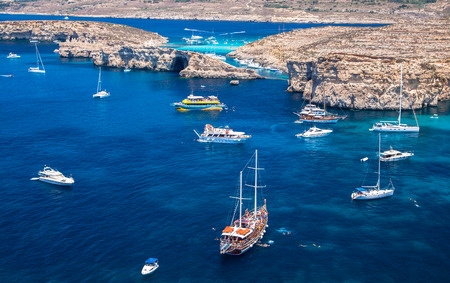 COMINO, MALTA - JULY 16: Ship at  Blue lagoon at island Comino - Malta on July 16, 2015 in Cominoのeditorial素材