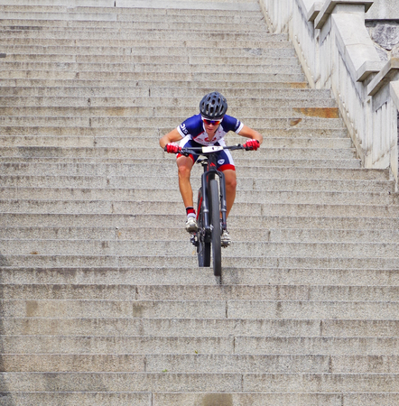 RUZOMBEROK, SLOVAKIA - SEPTEMBER 4: Mountain bike race - down stairs called Ruzomberske Schody on September 4, 2016 in Ruzomberokのeditorial素材