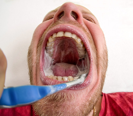 Brushing teeth - close up view. Dental hygieneの写真素材