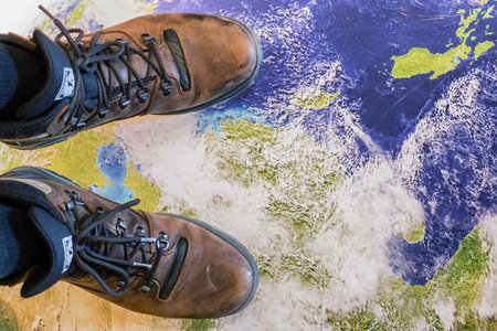 Walking on globe - planet earth