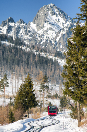 HREBIENOK, SLOVAKIA - JANUARY 24: Train on railwayis from in  High Tatras mountains on January 24, 2017 in Hrebienokのeditorial素材