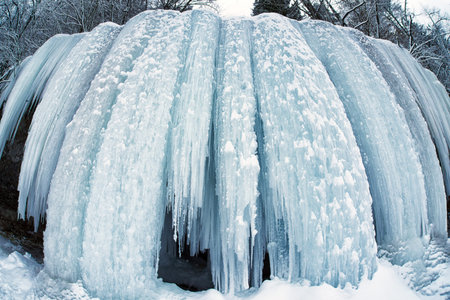 Frozen waterfall in winter. Icefall Siklava Skala, Slovakia