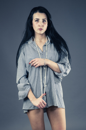 Pretty girl in shirtの写真素材