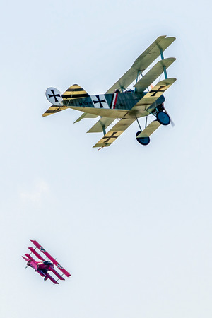 SLIAC, SLOVAKIA - AUGUST 27: Dogfight between triplanes at airshow SIAF 2017 on August 27, 2017 in Sliacのeditorial素材