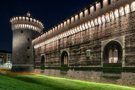 Sforza castle in piazza at night in Milano, Italyのeditorial素材