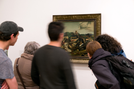 LONDON, UNITED KINGDOM - MAY 12: Visitors looking at Salvador Dali oil painting Autumnal Cannibalism paintings at Tate modern on May 12, 2018 in Londonのeditorial素材