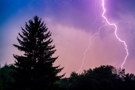 Thuderstorm. Lightning and dark clouds. Colorful skyの写真素材