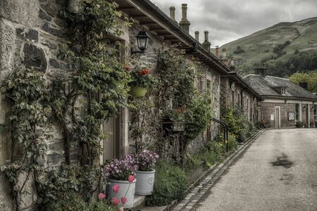LUSS, SCOTLAND - MAY 21: beautiful old houses in village Luss on May 21, 2018 in Lussのeditorial素材
