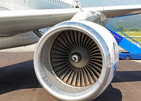 Turbine of airplane engine. Aircraft on runway