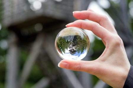 Lookout on hill Sunava in village Velke Borove, Slovakia. Crystal lensball reflection