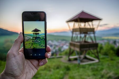 Lookout in village Liptovsky Jan, Slovakia on display of smartphoneの写真素材