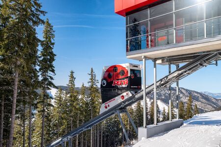 DEMANOVSKA DOLINA, SLOVAKIA - FEBRUARY 8: Funicular  Twinliner cabin top station in ski resort Jasna at Low Tatras mountains  on February 8, 2020 in Demanovska Dolinaのeditorial素材