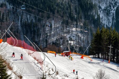 CHOPOK JUH, SLOVAKIA - FEBRUARY 8: Slope and ski lift and surface lift in resort Chopok Juh at Low Tatras mountains on February 8, 2020 in Chopok Juhのeditorial素材