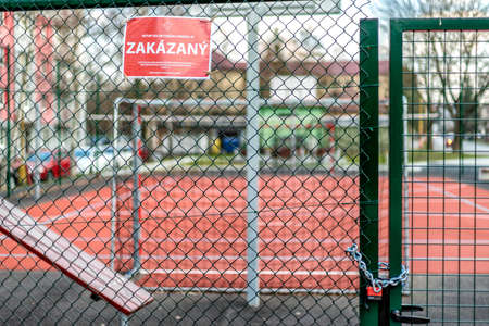 RUZOMBEROK, SLOVAKIA - APRIL 3, 2020: Closed basketball and football playground in centre of city due Coronavirus COVID-19のeditorial素材