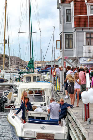 SMOGEN, SWEDEN - AUGUST 4, 2012 : A lot of tourists in fishing village Smogenのeditorial素材