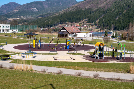 RUZOMBEROK, SLOVAKIA - APRIL 3, 2020: Closed children playground due Coronavirus COVID-19